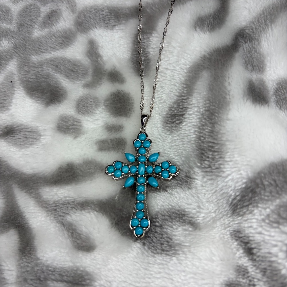 Sleeping beauty cross necklace